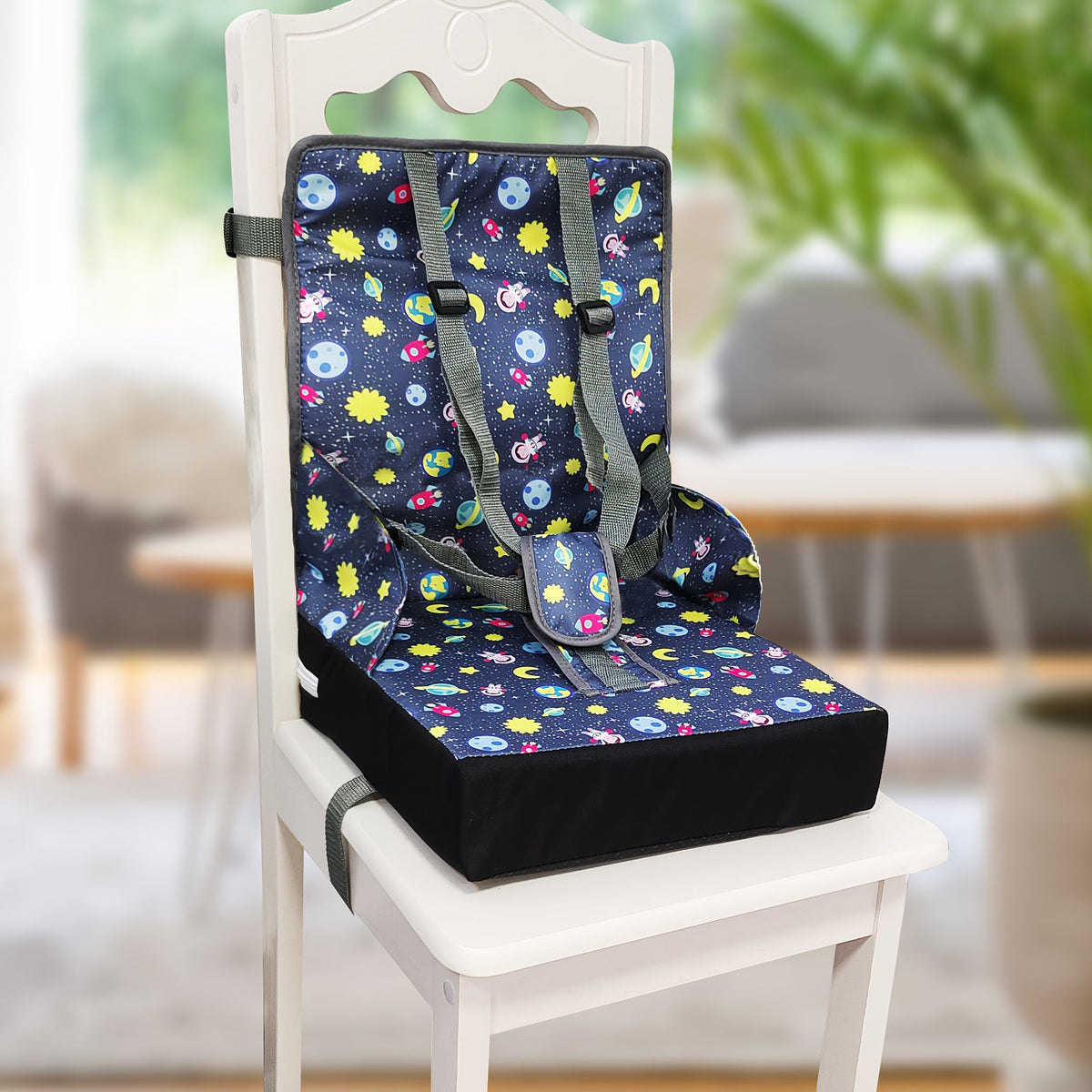 Dining Booster Seat Cushion with an Attached Back Pad and Adjustable Straps in Playful Printed Designs